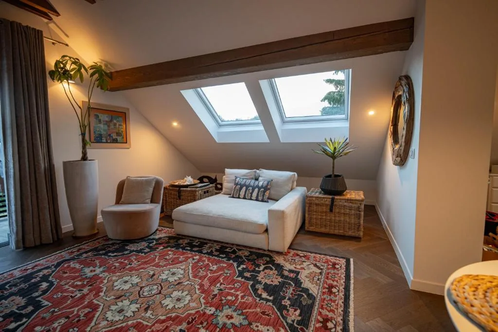 Penthouse interior with warm wood flooring at Maxis Penthouse Bled